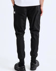 Stretch Warp Knit Coach's Slim Jogger Pants Reigning Champ   